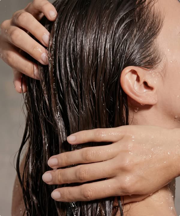 Rinsing shampoo thoroughly from hair